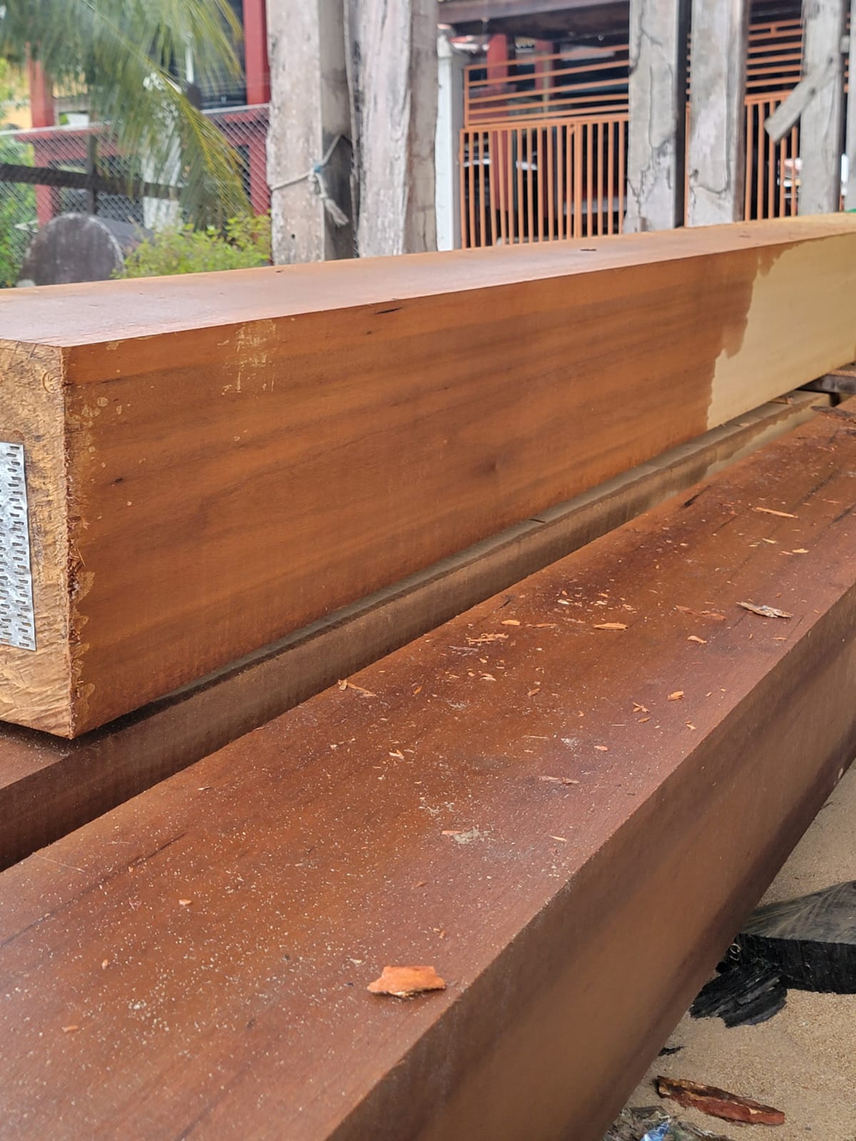 Dressed tropical hardwood beams showing rich grain and colour
